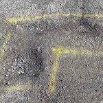 Before image of asphalt patch repair for Assita Group in Minto, New South Wales