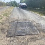 Completed asphalt patch repair on a driveway at a private residence in Dural, New South Wales