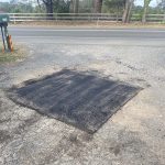 Completed asphalt patch repair on a driveway at a private residence in Dural, New South Wales