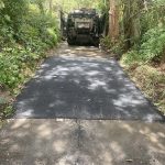 Completed asphalt patch repair on a driveway at a private residence in West Pymble, New South Wales
