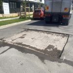 During image of an Asphalt Cut & Replace road repair for Highland Stone Walls Pty Ltd in Warriewood, New South Wales