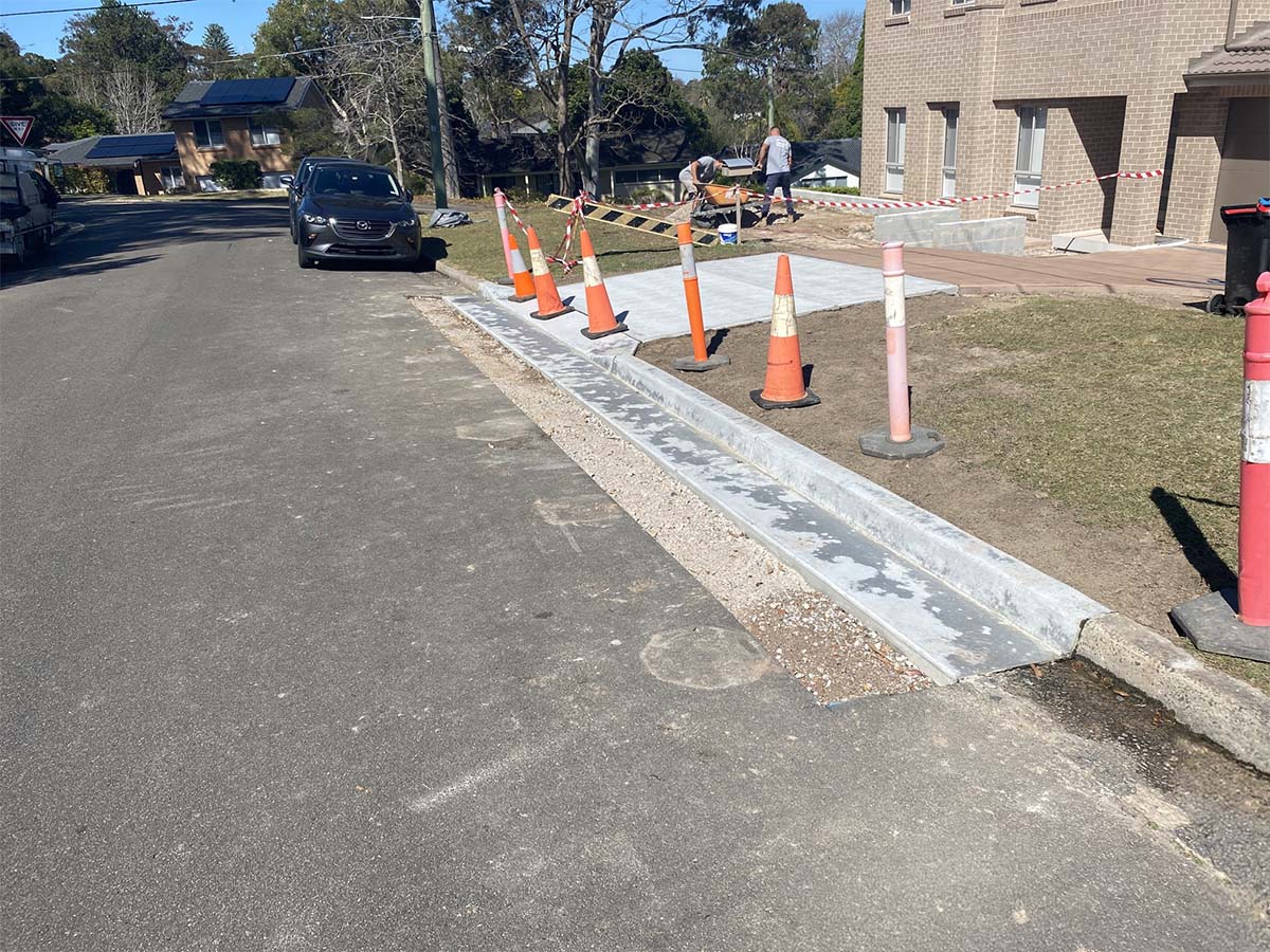 Before image of an Asphalt Crossover Edge Repair for Newborn Concrete in Forestville, New South Wales